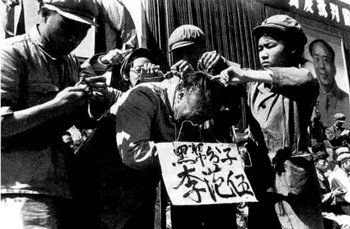 Red Guard shames elderly Chinese man with board, these young students not unlike those Marxist students at Yale. - Webmaster